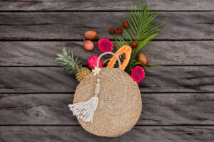composition with tropical fruits straw bag